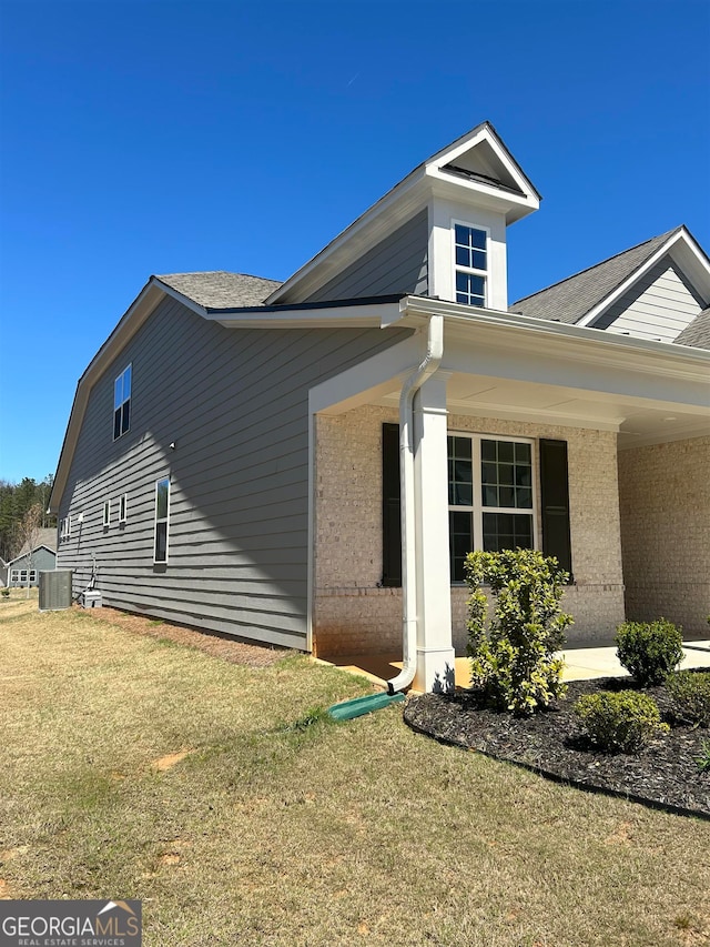 exterior space with a front yard