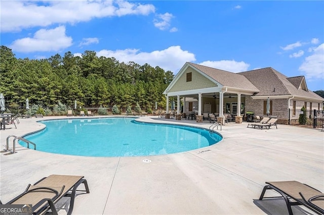 view of swimming pool featuring a patio