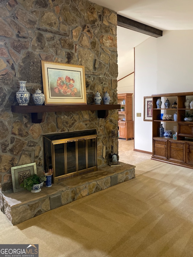 living room featuring a fireplace, lofted ceiling with beams, and light colored carpet