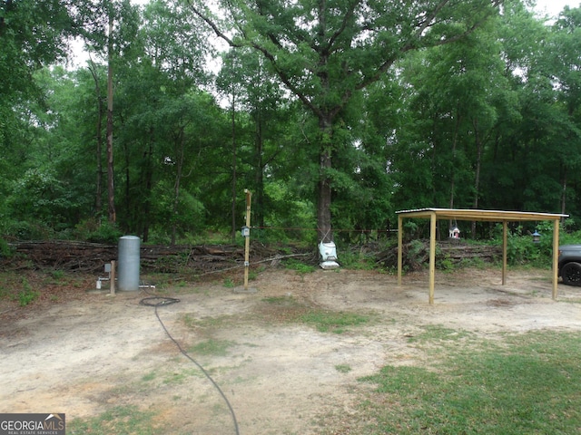 view of yard featuring a carport