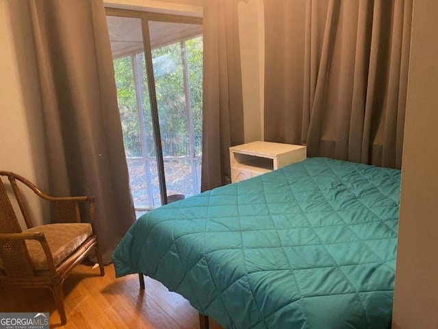 bedroom featuring hardwood / wood-style floors