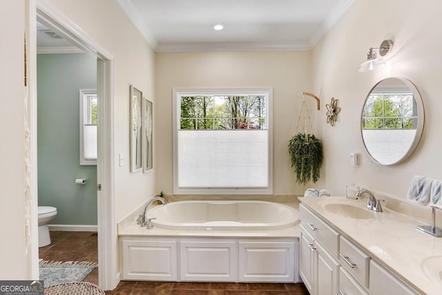 bathroom featuring a bathing tub, plenty of natural light, toilet, and tile flooring