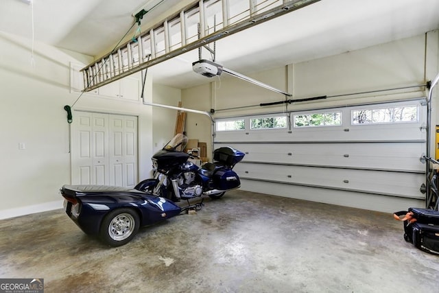 garage featuring a garage door opener