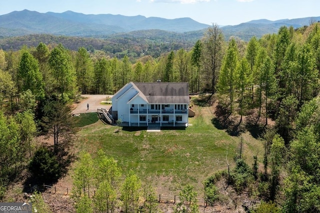 drone / aerial view featuring a mountain view