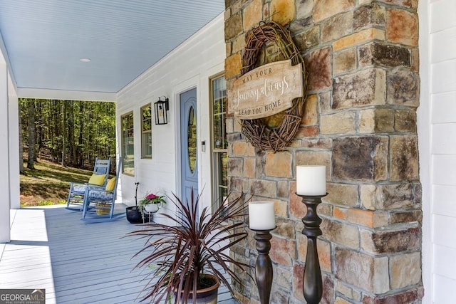 property entrance featuring covered porch