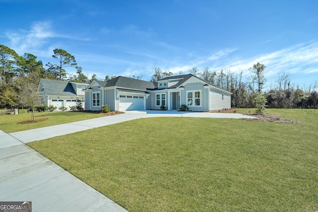 single story home with a garage and a front lawn