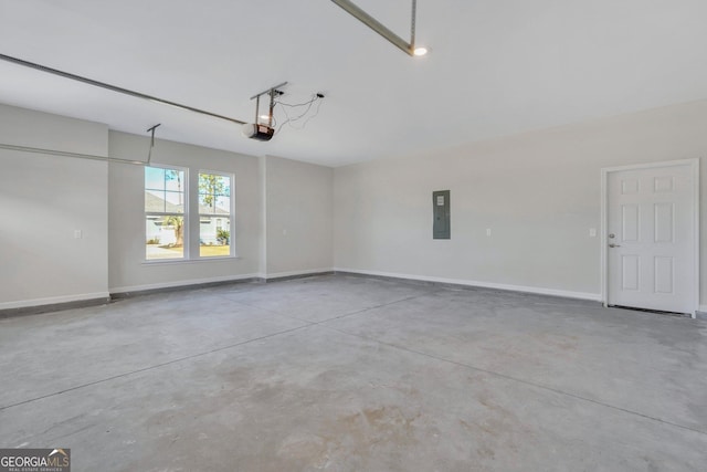 garage featuring a garage door opener and electric panel