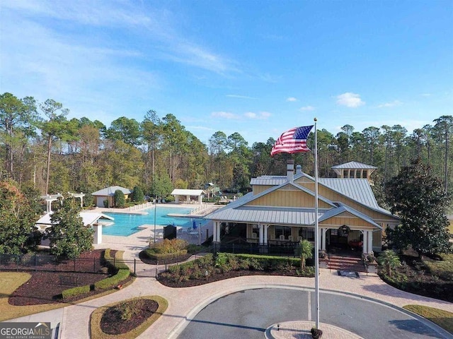 view of swimming pool with a patio