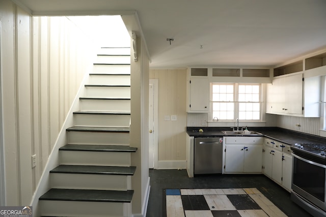 kitchen featuring sink, white cabinets, and stainless steel appliances