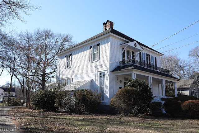 view of property exterior with a balcony