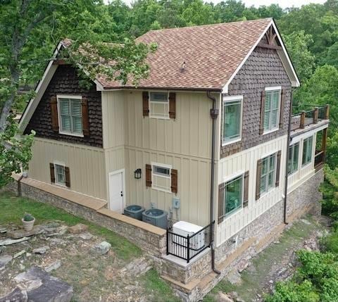 exterior space featuring central air condition unit