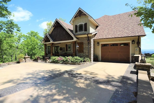 craftsman house with covered porch and a garage