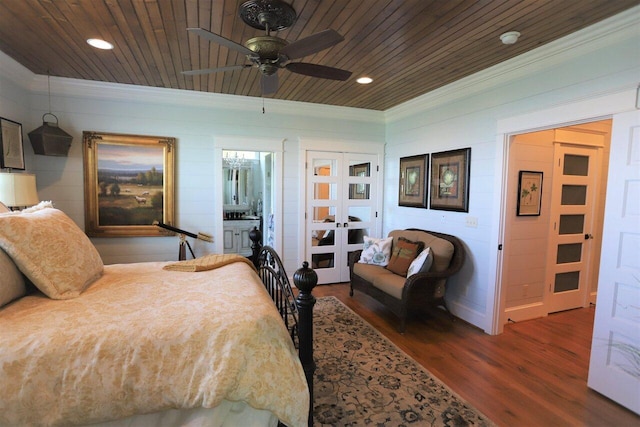 bedroom featuring ensuite bathroom, wood ceiling, and dark hardwood / wood-style flooring