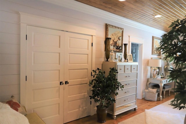 interior space featuring hardwood / wood-style flooring and wood ceiling