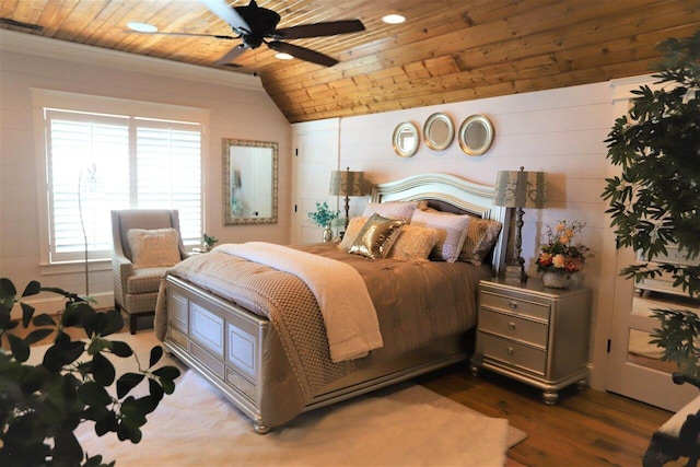 bedroom featuring wood-type flooring, lofted ceiling, ceiling fan, and wooden ceiling