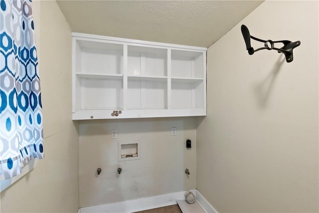 laundry area featuring washer hookup, a textured ceiling, hookup for a gas dryer, and electric dryer hookup