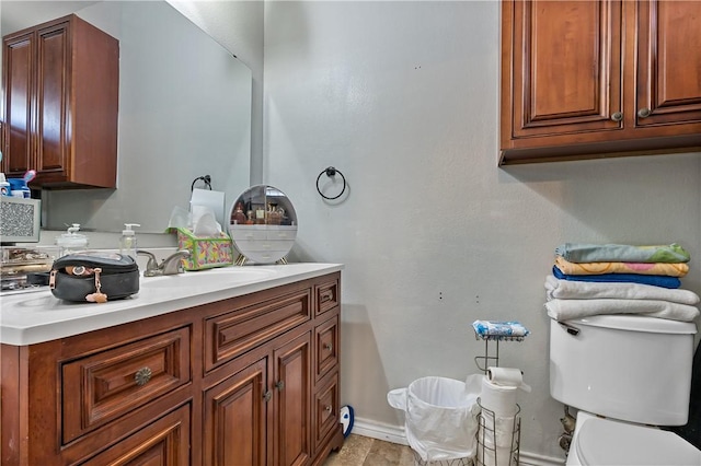 1205 Carolina St, College Station, TX 77840 - half bathroom with baseboards, vanity, and toilet