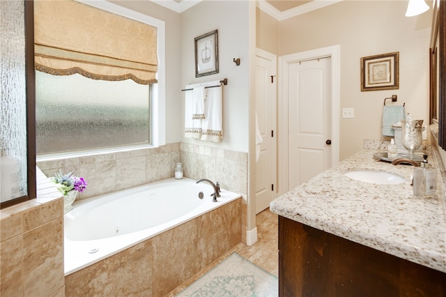 bathroom with vanity, a relaxing tiled tub, tile patterned floors, and crown molding