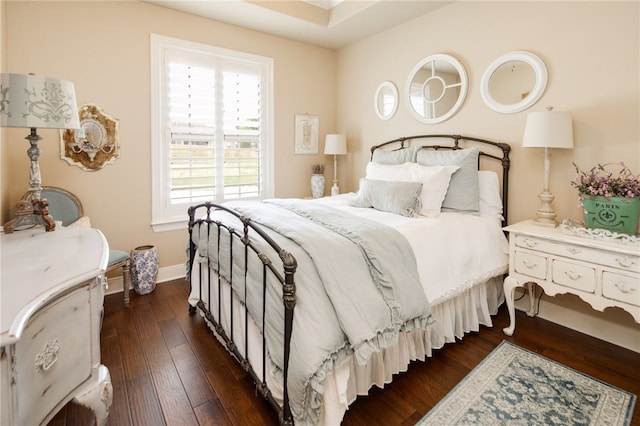 bedroom featuring dark hardwood / wood-style flooring