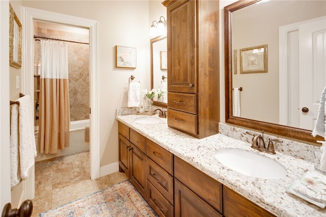 bathroom with shower / bath combination with curtain and vanity