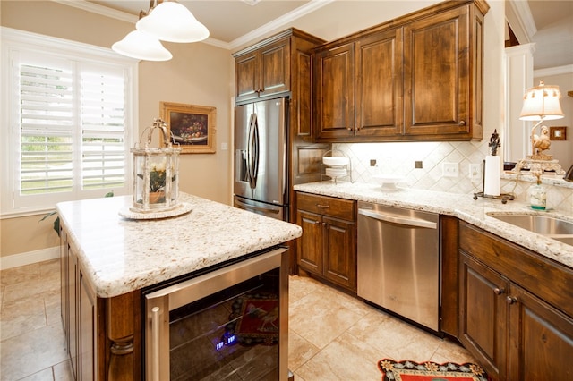 kitchen featuring backsplash, stainless steel appliances, crown molding, wine cooler, and hanging light fixtures