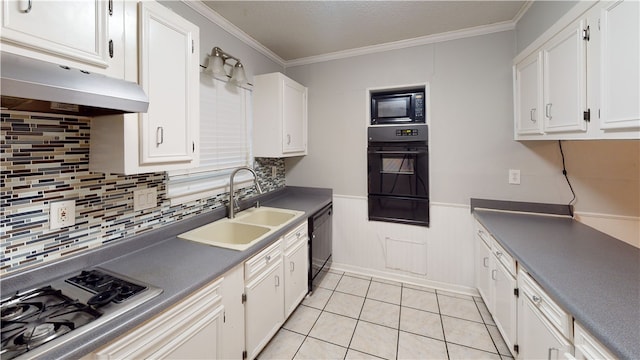 kitchen with sink, white cabinets, black appliances, and ornamental molding