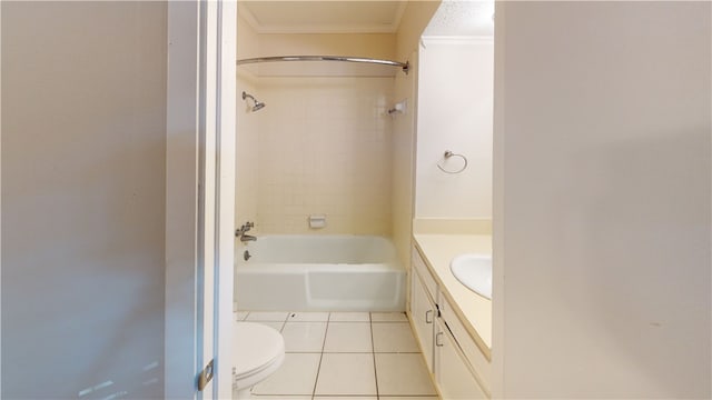 full bathroom with vanity, tile patterned floors, tiled shower / bath, toilet, and ornamental molding