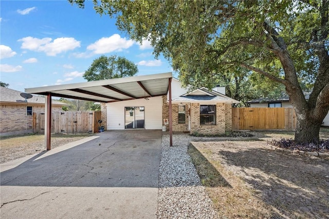 view of front of house with a carport