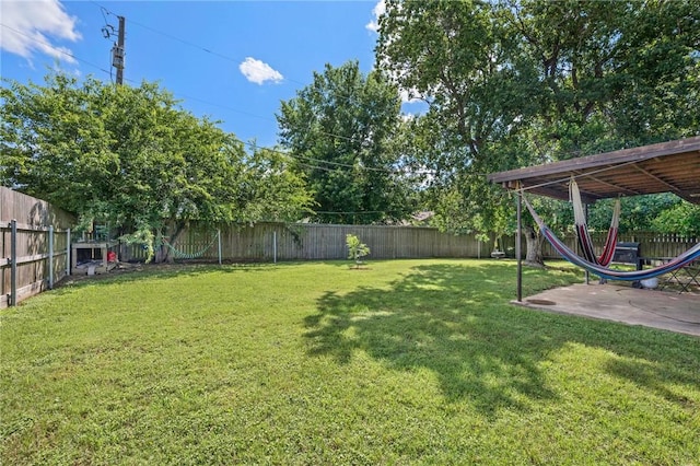 3108 Bluestem Dr, College Station, TX 77845 - view of yard featuring a patio
