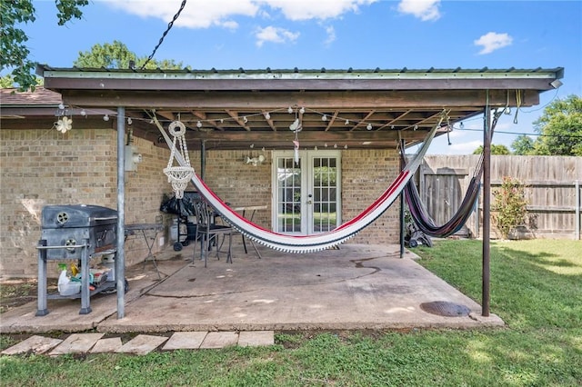 3108 Bluestem Dr, College Station, TX 77845 - view of patio with french doors and area for grilling