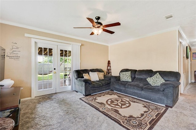 3108 Bluestem Dr, College Station, TX 77845 - living room featuring french doors, carpet, a ceiling fan, crown molding, and baseboards