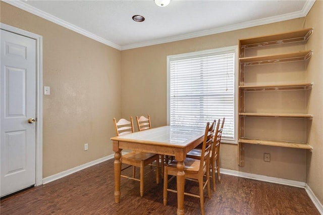 3108 Bluestem Dr, College Station, TX 77845 - dining area featuring wood finished floors, baseboards, and ornamental molding