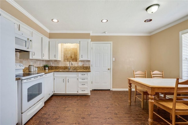 3108 Bluestem Dr, College Station, TX 77845 - kitchen featuring white appliances, white cabinets, a sink, crown molding, and dark wood finished floors