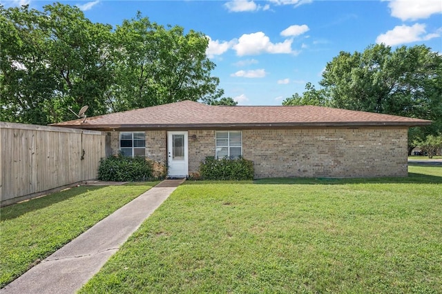 3108 Bluestem Dr, College Station, TX 77845 - single story home with brick siding