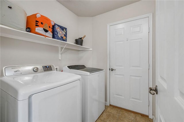 washroom featuring separate washer and dryer