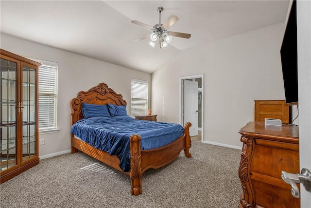 carpeted bedroom featuring ceiling fan and lofted ceiling