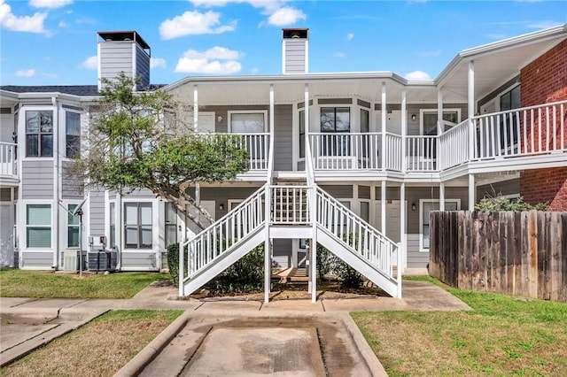 view of property featuring stairway