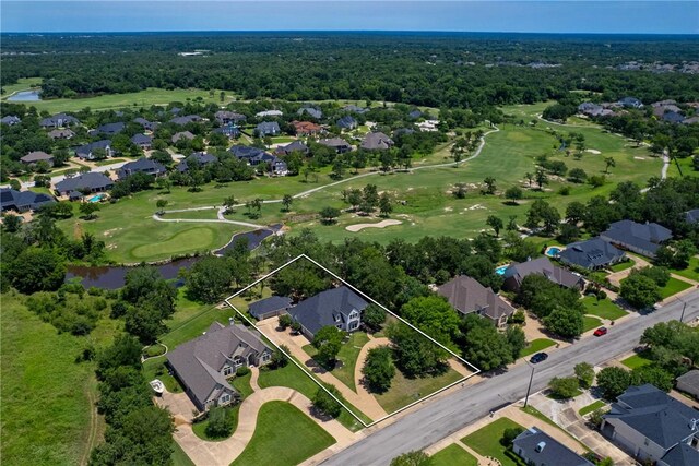 1107 Royal Adelade Dr, College Station, TX 77845 - view of home's community featuring view of golf course, a lawn, and a water view
