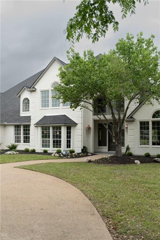 1107 Royal Adelade Dr, College Station, TX 77845 - view of front of property featuring a front lawn