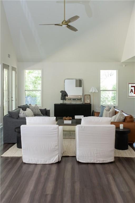 1107 Royal Adelade Dr, College Station, TX 77845 - living area featuring high vaulted ceiling, a ceiling fan, visible vents, and dark wood-style flooring