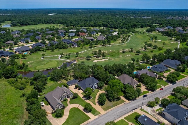 1107 Royal Adelade Dr, College Station, TX 77845 - surrounding community with a water view and a lawn