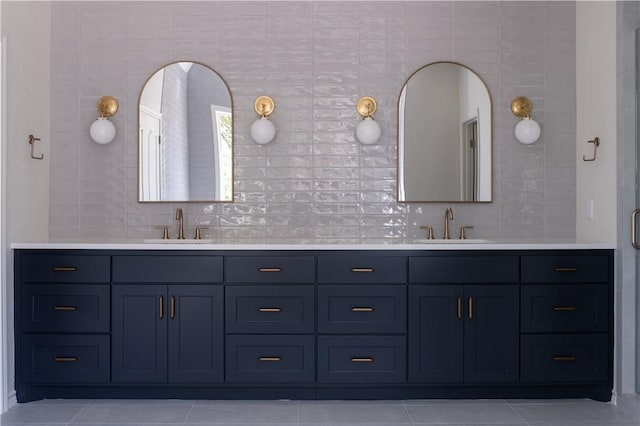 1107 Royal Adelade Dr, College Station, TX 77845 - bathroom featuring tile patterned floors, double vanity, and a sink