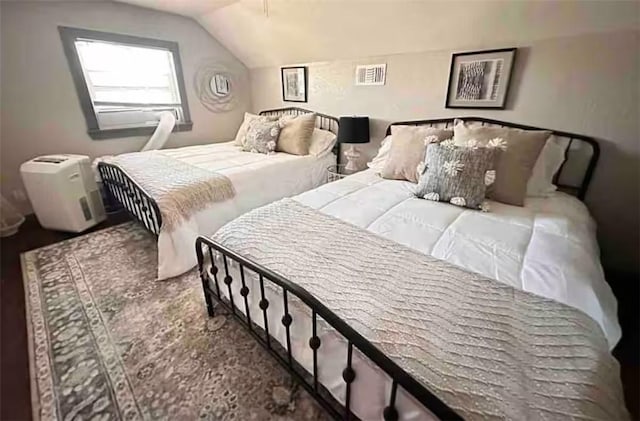 1017 Milner Dr, College Station, TX 77840 - bedroom featuring vaulted ceiling