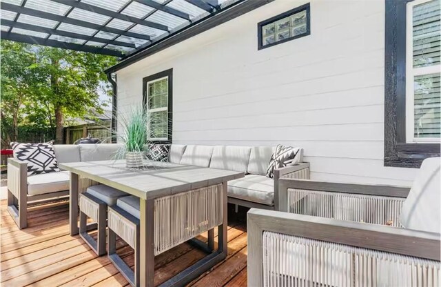 1017 Milner Dr, College Station, TX 77840 - wooden terrace featuring an outdoor living space, a pergola, and outdoor dining area