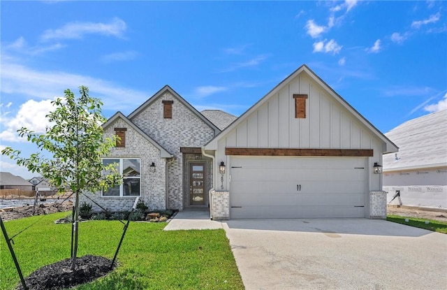 view of front facade with a garage and a front lawn