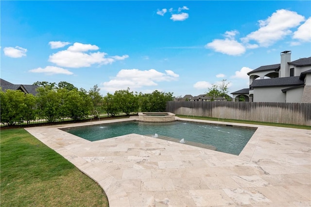 view of swimming pool with fence, a patio area, and a pool with connected hot tub