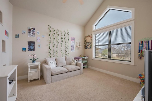 interior space featuring baseboards, light carpet, and vaulted ceiling