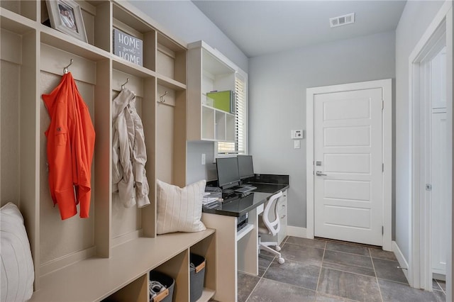 mudroom featuring visible vents and baseboards