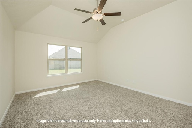 carpeted empty room with lofted ceiling, baseboards, and a ceiling fan