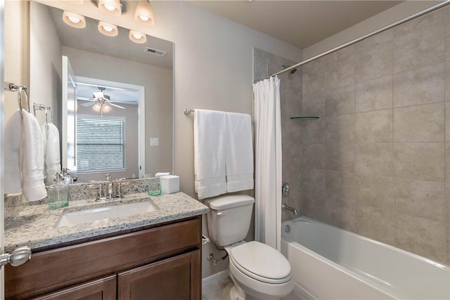 5323 Lyle Pl, Bryan, TX 77807 - bathroom featuring vanity, toilet, shower / bath combo, and a ceiling fan